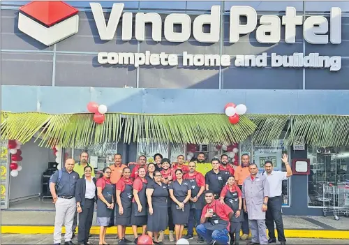  ?? Picture: SUPPLIED ?? Vinod Patel staff members in front of the newly opened branch at Tebara Plaza in Nakasi.