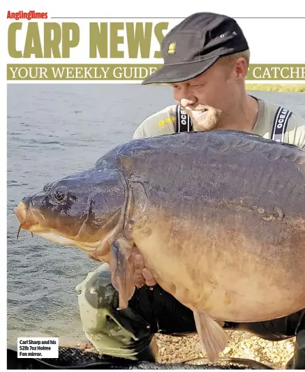  ??  ?? Carl Sharp and his 52lb 7oz Holme Fen mirror.