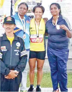  ??  ?? GOLDEN GIRL: Juliana Gumpil emerged among five Sabahan athletes who bagged four gold medals at the meet.