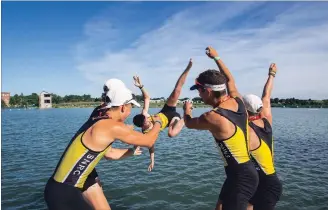  ?? JULIE JOCSAK THE ST. CATHARINES STANDARD ?? The South Niagara crew of Jacob Combe, Jacob Gula, Jeremy Langelaan, Alex Barnes toss coxswain Riley O'Neill into the Henley after winning gold in the men's senior 64kg cox four during the fourth day of racing at the Royal Canadian Henley Regatta on Friday.