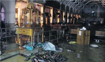  ?? FOTO: AP ?? > Imagen de una de las iglesias destruidas por una de las explosione­s en Sri Lanka.