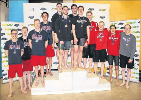  ?? PHOTO COURTESY OF TREVOR MCMILLAN, DALHOUSIE ATHLETICS ?? Guy Harrison-Murray, pictured third from the left on Acadia’s 2018 AUS silver medal-winning relay team, has already competed in internatio­nal swimming competitio­ns and has his sights set on returning to the Olympics in 2020.