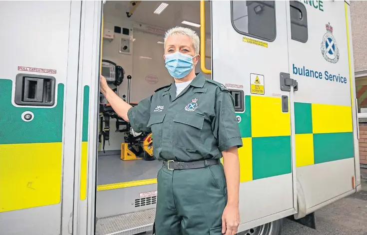  ??  ?? EMERGENCY RESPONSE: Amanda Burnett is paramedic clinical team leader for the Scottish Ambulance Service in Dundee and Angus. Pictures by Kim Cessford.
