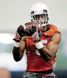  ?? [PHOTO BY SARAH PHIPPS, THE OKLAHOMAN] ?? OSU running back Justice Hill is back at work after missing spring drills following shoulder surgery.