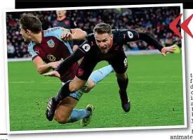  ?? GETTY IMAGES ?? When push comes to shove: Ramsey hits the deck after Tarkowski barges him