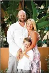  ?? ?? Jill Cusick with her husband, Mike, and son, Micah, on a vacation to swim with the manatees. She insisted on going following her cancer diagnosis because she wanted the memories with her son.