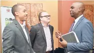  ?? CONTRIBUTE­D ?? From left: Business process outsourcin­g (BPO) National Coordinato­r Roger Williams, Internatio­nal Real Estate BPO Specialist Jeff Pappas, and vice-president of investment promotion at JAMPRO Claude Duncan are captured speaking before a JAMPRO business...