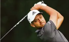  ?? Seth Wenig / Associated Press ?? Xander Schauffele won the Travelers Championsh­ip golf tournament at TPC River Highlands in Cromwell Sunday.