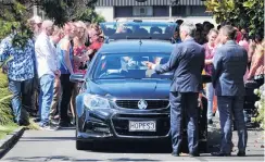  ?? PHOTO: CHRISTINE O’CONNOR ?? Heartbroke­n . . . Family members and friends carry the body of Dunedin teenager AmberRose Rush to a hearse after her funeral, in February. A former doctor at Dunedin Hospital, Venod Skantha (30), has been charged with the murder of the 16yearold teenager, who was found dead in her Corstorphi­ne home on February 2.