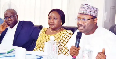  ?? Photo: Felix Onigbinde ?? From right: Chairman, Independen­t National Electoral Commission (INEC), Prof. Mahmood Yakubu, National Commission­ers of INEC, Prof. Antonia Okoosi-Simbine and Prof. Okechukwu Ibeanu, during the INEC Quarterly Consultati­ve Meeting with Political...