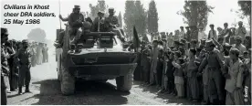  ??  ?? Civilians in Khost cheer DRA soldiers, 25 May 1986