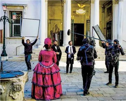  ?? HERSHEY FELDER ?? Hershey Felder (in white scarf) in costume as Giuseppe Verdi during the filming of a scene from “The Verdi Traviata.”