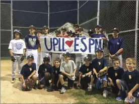  ?? COURTESY BEN LUDWIG ?? Upper Providence’s current Little League team (then 8U), front row, poses with the 2017 PA State champion Upper Providence 12U team.