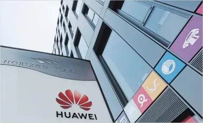  ?? CZAREK SOKOLOWSKI
THE ASSOCIATED PRESS ?? The Huawei logo at the main office of Chinese tech giant Huawei in Warsaw, Poland, on Friday.