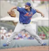  ?? Jeff Roberson / Associated Press ?? Mets starter Jason Vargas throws in the first inning during Thursday’s 3-2 spring training victory over the Cardinals in Jupiter, Fla. Vargas allowed only Matt Carpenter’s leadoff home run in his twoinning stint.