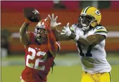  ?? SCOT TUCKER — THE ASSOCIATED PRESS FILE ?? 49ers cornerback Jason Verrett (22) intercepts a pass in front of Green Bay Packers wide receiver Davante Adams (17) in Santa Clara on Thursday, Nov. 5, 2020. The 49ers are bringing back Verrett on a one-year deal.