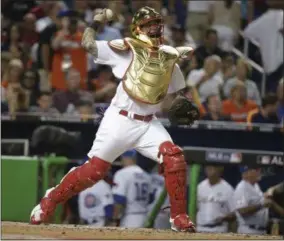  ?? LYNNE SLADKY — THE ASSOCIATED PRESS ?? National League’s St. Louis Cardinals catcher Yadier Molina (4), throws during the sixth inning at the MLB baseball All-Star Game on July 11 in Miami.