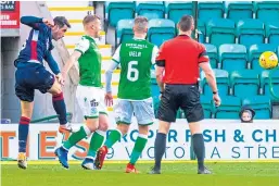  ?? SNS. ?? Brian Graham scores for Ross County at Easter Road.