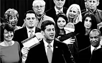  ?? WIN MCNAMEE/GETTY IMAGES ?? House Speaker Paul Ryan, seen introducin­g tax legislatio­n, says the plan would save the average U.S. family $1,182 a year.