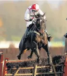  ??  ?? ■ Who Dares Wins chases Chester Cup