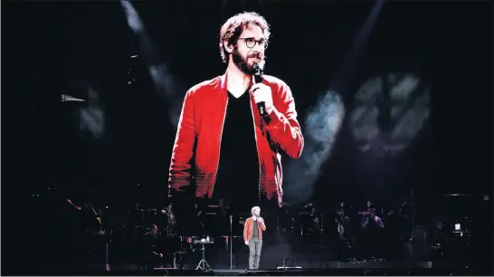  ?? [RON GRABOWSKI/INVISION] ?? Josh Groban sings in front of a large screen showing his image; Groban will perform on Thursday at Nationwide Arena.