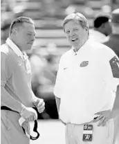  ?? JOHN RAOUX/ASSOCIATED PRESS ?? Both Tennessee’s Butch Jones and Florida’s Jim McElwain need a win Saturday to soothe their festering fan bases.