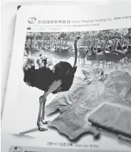  ?? Ng Han Guan photos / Associated Press ?? A page of the 2018 Korea Commoditie­s catalog, produced to promote internatio­nal trade.