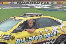  ?? JEFF GLUCK, USA TODAY SPORTS ?? Honorary Sprint All-Star Race pace car driver Greg Olsen takes the wheel Wednesday at Charlotte Motor Speedway.