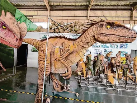  ?? Courtesy of Jurassic Extreme ?? Three dinosaur costumes from the business Jurassic Extreme went missing when a storage trailer was broken into Feb. 22, following the theft of two baby dinosaur costumes in December. Owners are offering a reward for recovering the trailer.