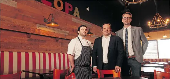  ?? Stuart Gradon/Calgary Herald ?? From left, chef Sheldon Guindon, operations manager John Robarts and Tim Ormond, at the recently opened Scopa neighbourh­ood Italian restaurant on Calgary’s Centre Street.