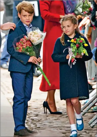  ?? ?? LITTLE BLOOMERS: George and Charlotte on flower-collecting duties for their mum