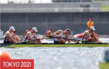  ??  ?? TOKYO 2021
Agony: Team GB’s coxless four slump dejected after finishing fourth on Wednesday