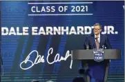  ?? MATT KELLEY/ASSOCIATED PRESS ?? NASCAR Hall of Fame Class of 2021 inductee Dale Earnhardt Jr. smiles during the induction ceremony on Friday in Charlotte, N.C.