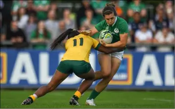  ??  ?? Katie Fitzhenry is tackled by Australia’s Mahalia Murphy in the 2017 World Cup clash in Belfield, Dublin.