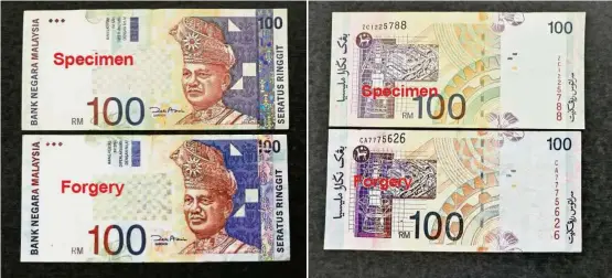  ??  ?? Hard to differenti­ate: A look at a real RM100 note and a forgery (below) shows that both sets are almost identical. It is learnt that these fake notes are in circulatio­n now.