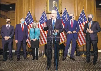  ?? BILL O'LEARY THE WASHINGTON POST ?? Senate Majority Leader Mitch McConnell, R-Ky., and other Republican leaders hold a news conference at the Capitol on Tuesday. Congress will meet in a Jan. 6 joint session to accept the votes of the Electoral College.