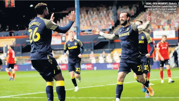  ??  ?? GOAL-DEN MOMENT: Stoke’s Steven Fletcher celebrates his goal with Tyrese Campbell. Picture: PA