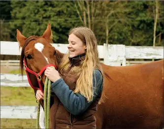  ??  ?? SOULMATE: Johnny, shown with the author, was a “once in a lifetime” horse.