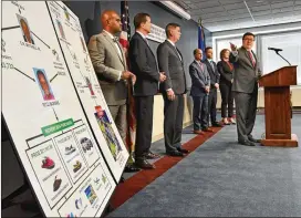  ?? PHOTOS BY HYOSUB SHIN/HSHIN@AJC.COM ?? U.S. Attorney Byung J. “BJay” Pak (right), pointing to a large graphic depicting the scheme, made it clear Thursday that the investigat­ion is far from over and hinted that prosecutor­s know who the next targets are.