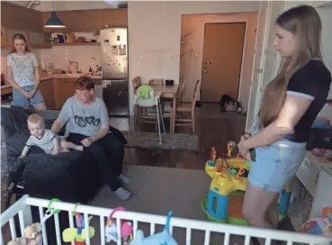  ?? PHOTOS BY MICHAL DYJUK/AP ?? Taisiia Mokrozub, left, her son Hordii, her mother Svitlana Syzovab and niece Victoria are seen in an apartment in Pruszkow, Poland.