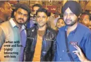  ??  ?? Farhan with crew and fans. (right) Interactin­g with kids