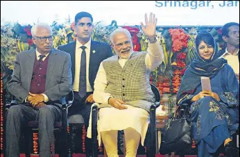  ?? WASEEM ANDRABI/HT ?? J&K governor NN Vohra, Prime Minister Narendra Modi, chief minister Mehbooba Mufti and Union minister Jitendra Singh during a function at Sherikashm­ir Internatio­nal Convention Centre (SKICC) in Srinagar on Saturday.