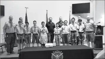  ?? LOANED PHOTO ?? THE BOY SCOUTS OF AMERICA TROOP 8168 STAND with City of Yuma Mayor Douglas Nicholls at the Day of Peace event.