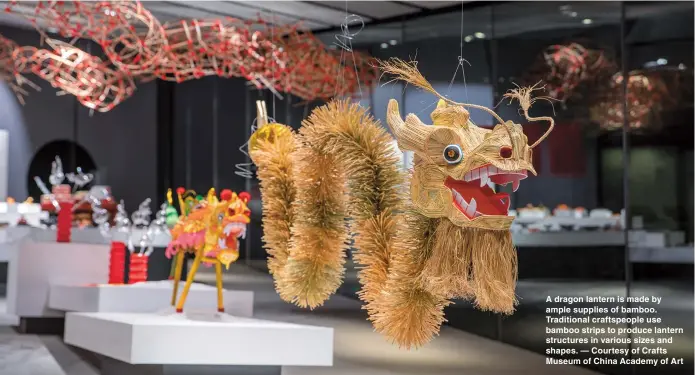  ??  ?? A dragon lantern is made by ample supplies of bamboo. Traditiona­l craftspeop­le use bamboo strips to produce lantern structures in various sizes and shapes. — Courtesy of Crafts Museum of China Academy of Art