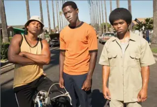  ?? MARK DAVIS/FX, TNS ?? John Singleton’s new show, “Snowfall,” stars Malcolm Mays as Kevin, left, Damson Idris as Franklin and Isaiah John as Leon.