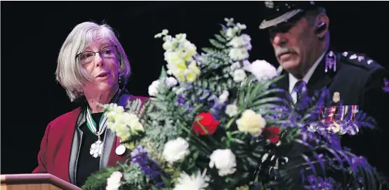  ?? — THE CANADIAN PRESS ?? Lt.-Gov. Judith Guichon speaks about former NDP premier Dave Barrett during a state memorial service at the University of Victoria on Saturday. “The volume of bills, and the lasting nature of the changes wrought during the short duration of that first...