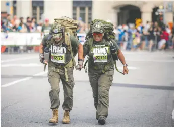  ?? ASHLEY FRASER ?? Runners Marc Gerszke and Jennifer Gerszke take part in the 2023 Canada Army Run, which should be enhanced to better serve as a military recruitmen­t tool, Ed Storey says.