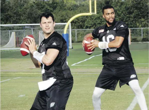  ?? MURRAY McCORMICK ?? Saskatchew­an Roughrider­s quarterbac­ks Zach Collaros, left, and Brandon Bridge are in the most obvious battle in the CFL to win a No. 1 starter’s job heading into training camp, and on the eve of the team’s regular season opener, coach Chris Jones still...