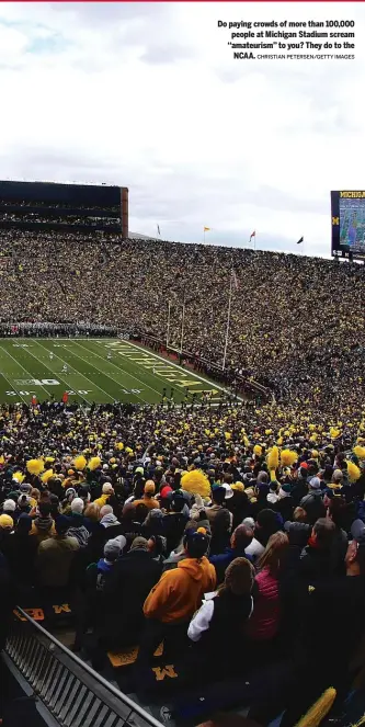  ?? CHRISTIAN PETERSEN/GETTY IMAGES ?? Do paying crowds of more than 100,000 people at Michigan Stadium scream ‘‘amateurism’’ to you? They do to the NCAA.