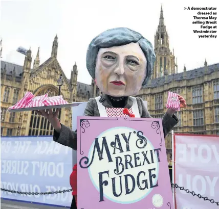  ??  ?? &gt; A demonstrat­or dressed as Theresa May selling Brexit Fudge at Westminste­r yesterday